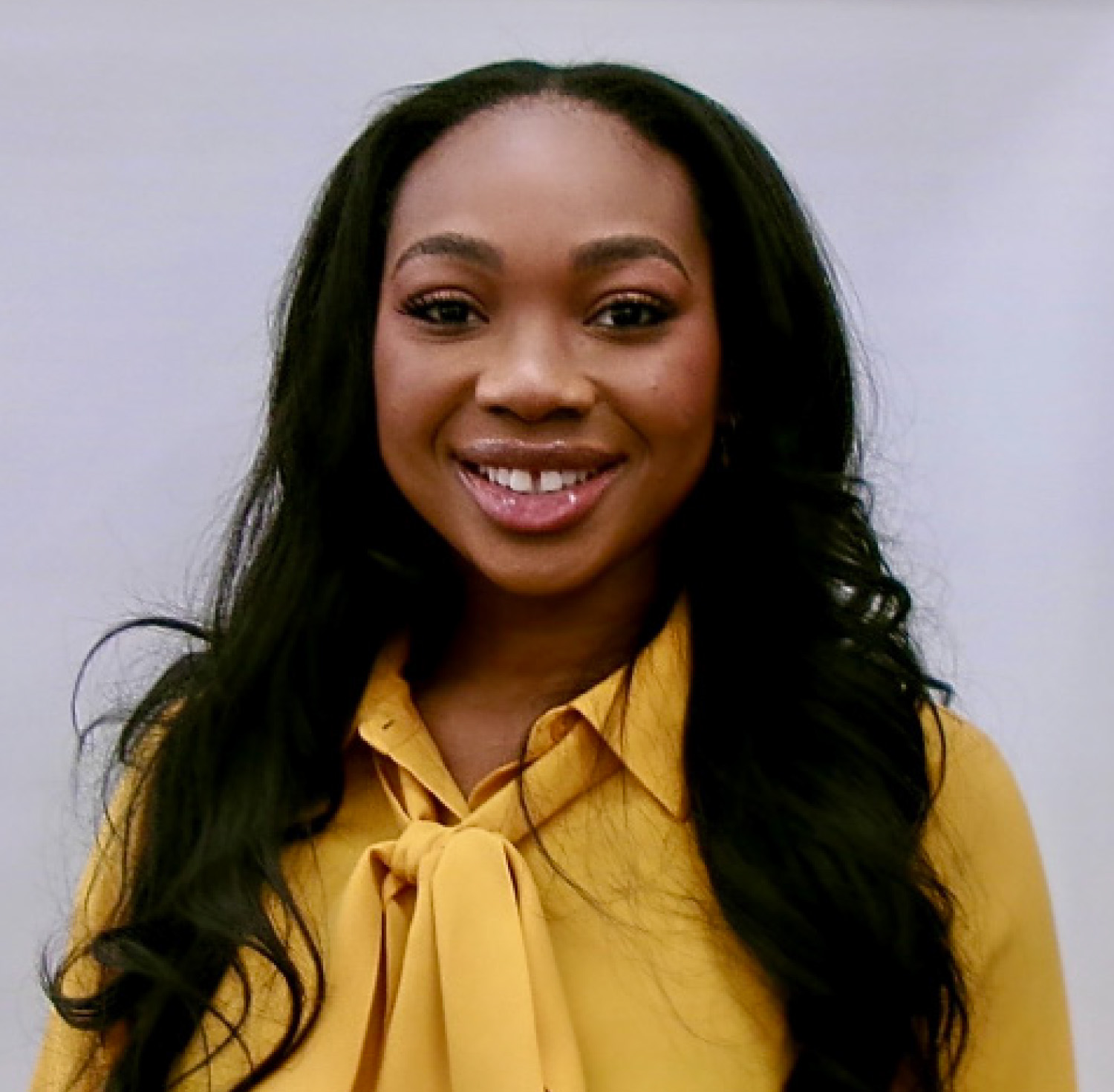 Headshot of Mina Iyaye